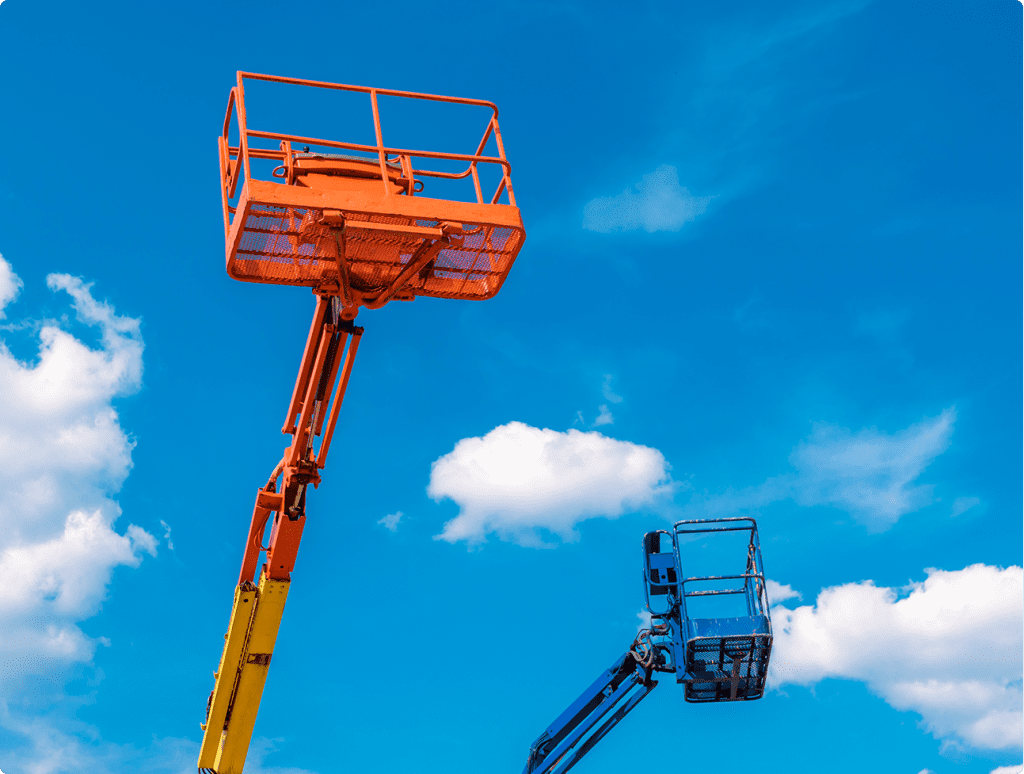 a yellow and blue lift with a blue sky in the background.