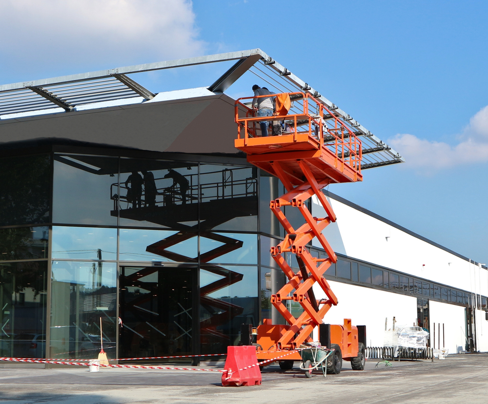 how to load a scissor lift onto a trailer